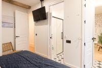 TV a/nebo společenská místnost v ubytování New Abando AC by Staynnapartments