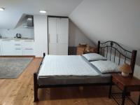 Postel nebo postele na pokoji v ubytování Forest Romantic Apartment Brdy