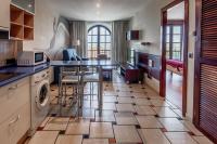 A kitchen or kitchenette at Apartamentos Costa Esmeralda