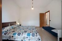 Posteľ alebo postele v izbe v ubytovaní Sibi Apartment