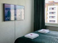 Postel nebo postele na pokoji v ubytování Borg Apt City Central