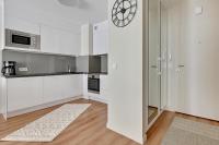 Kuchyňa alebo kuchynka v ubytovaní Wave Apartments - Powstańców Wielkopolskich
