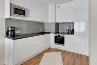 Kuchyňa alebo kuchynka v ubytovaní Wave Apartments - Powstańców Wielkopolskich