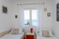 Posteľ alebo postele v izbe v ubytovaní Apartment Lusi