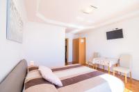 Postel nebo postele na pokoji v ubytování Apartments Marnic- Blue Chill