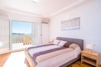 Postel nebo postele na pokoji v ubytování Apartments Marnic- Blue Chill