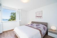 Postel nebo postele na pokoji v ubytování Apartments Marnic- Blue Chill