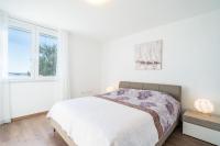 Postel nebo postele na pokoji v ubytování Apartments Marnic- Blue Chill