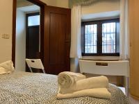 Posteľ alebo postele v izbe v ubytovaní "The Gole of Alcantara Living in the Dream's Room"