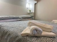Posteľ alebo postele v izbe v ubytovaní "The Gole of Alcantara Living in the Dream's Room"
