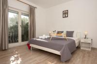Postel nebo postele na pokoji v ubytování Holiday House San Mario - Pets Friendly Rural Home