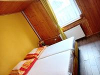 Łóżko lub łóżka w pokoju w obiekcie Holiday Ozon