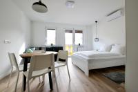 Postel nebo postele na pokoji v ubytování Standard Apartment by Hi5 - Dessewffy 37 suites