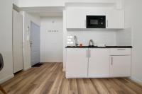 Kuchyň nebo kuchyňský kout v ubytování Standard Apartment by Hi5 - Dessewffy 37 suites