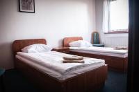 Posteľ alebo postele v izbe v ubytovaní Hotel Ach To Tu