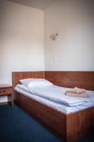 Posteľ alebo postele v izbe v ubytovaní Hotel Ach To Tu