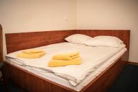 Posteľ alebo postele v izbe v ubytovaní Hotel Ach To Tu