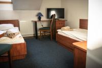 Posteľ alebo postele v izbe v ubytovaní Hotel Ach To Tu