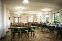 Reštaurácia alebo iné gastronomické zariadenie v ubytovaní Hotel Ach To Tu