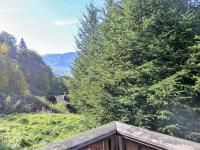 a view from the balcony of a house in the mountains at Chalet Evasion by Interhome in Les Bossons