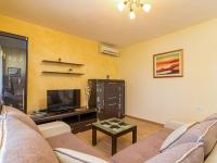 Televízia a/alebo spoločenská miestnosť v ubytovaní Holiday Home Sonja by Interhome