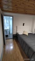 Posteľ alebo postele v izbe v ubytovaní Hostal ARS