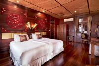 Postel nebo postele na pokoji v ubytování Ruenkanok Thaihouse Resort