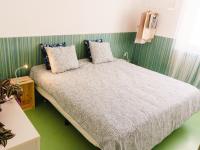 Postel nebo postele na pokoji v ubytování Hospedium Hostel República Surf House