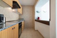 A kitchen or kitchenette at Apt 2 Las Palmeras iii Lanzarote