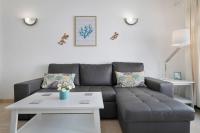 A seating area at Apt 2 Las Palmeras iii Lanzarote