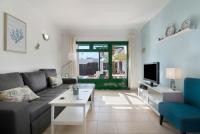 A television and/or entertainment centre at Apt 2 Las Palmeras iii Lanzarote