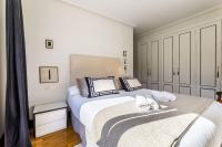 Posteľ alebo postele v izbe v ubytovaní LA CONCHA BEACHVIEW by SWEET HOME SAN SEBASTIAN