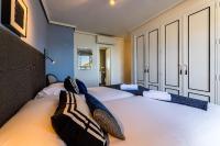 Posteľ alebo postele v izbe v ubytovaní LA CONCHA BEACHVIEW by SWEET HOME SAN SEBASTIAN