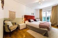 Posteľ alebo postele v izbe v ubytovaní LA CONCHA BEACHVIEW by SWEET HOME SAN SEBASTIAN
