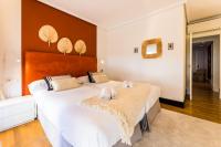 Posteľ alebo postele v izbe v ubytovaní LA CONCHA BEACHVIEW by SWEET HOME SAN SEBASTIAN