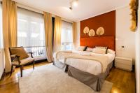 Posteľ alebo postele v izbe v ubytovaní LA CONCHA BEACHVIEW by SWEET HOME SAN SEBASTIAN