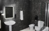 Un baño de Hotel Manzanito