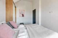 Posteľ alebo postele v izbe v ubytovaní LOFT 1&2 - Grano Residence