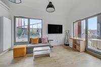 Televízia a/alebo spoločenská miestnosť v ubytovaní LOFT 1&2 - Grano Residence