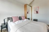 Posteľ alebo postele v izbe v ubytovaní LOFT 1&2 - Grano Residence