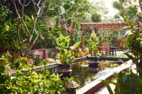 Zahrada ubytování Ruenkanok Thaihouse Resort