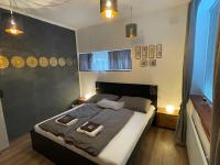 Łóżko lub łóżka w pokoju w obiekcie Kunstwerk AppARTement