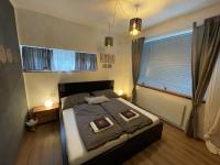 Łóżko lub łóżka w pokoju w obiekcie Kunstwerk AppARTement
