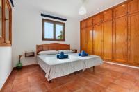 Postel nebo postele na pokoji v ubytování Las Casitas 28