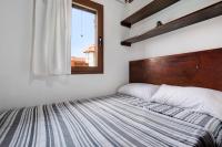 Postel nebo postele na pokoji v ubytování Las Casitas 28