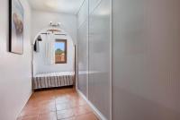 Postel nebo postele na pokoji v ubytování Las Casitas 28