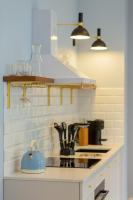 Kuchyňa alebo kuchynka v ubytovaní LUX Golden Apartment Praga Kępna by Renters Prestige