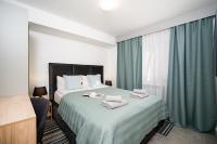 Postel nebo postele na pokoji v ubytování Apartments Palma Rabac