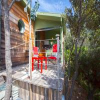 En balkon eller terrasse p&aring; Les G&icirc;tes du Cap Corse
