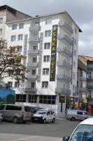 a large white building with a hotel sign on it at SAKALİFE APART Otel in Erzurum